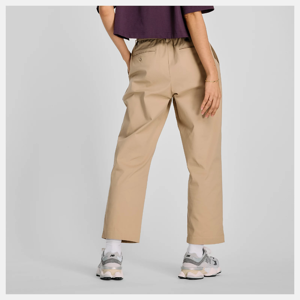 NEW BALANCE 長褲 女 運動褲 防潑水 卡其 AW